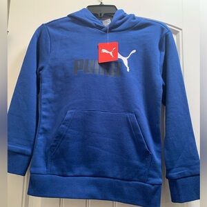 The puma boys logo hoodie, blue with the puma logo, long sleeves.